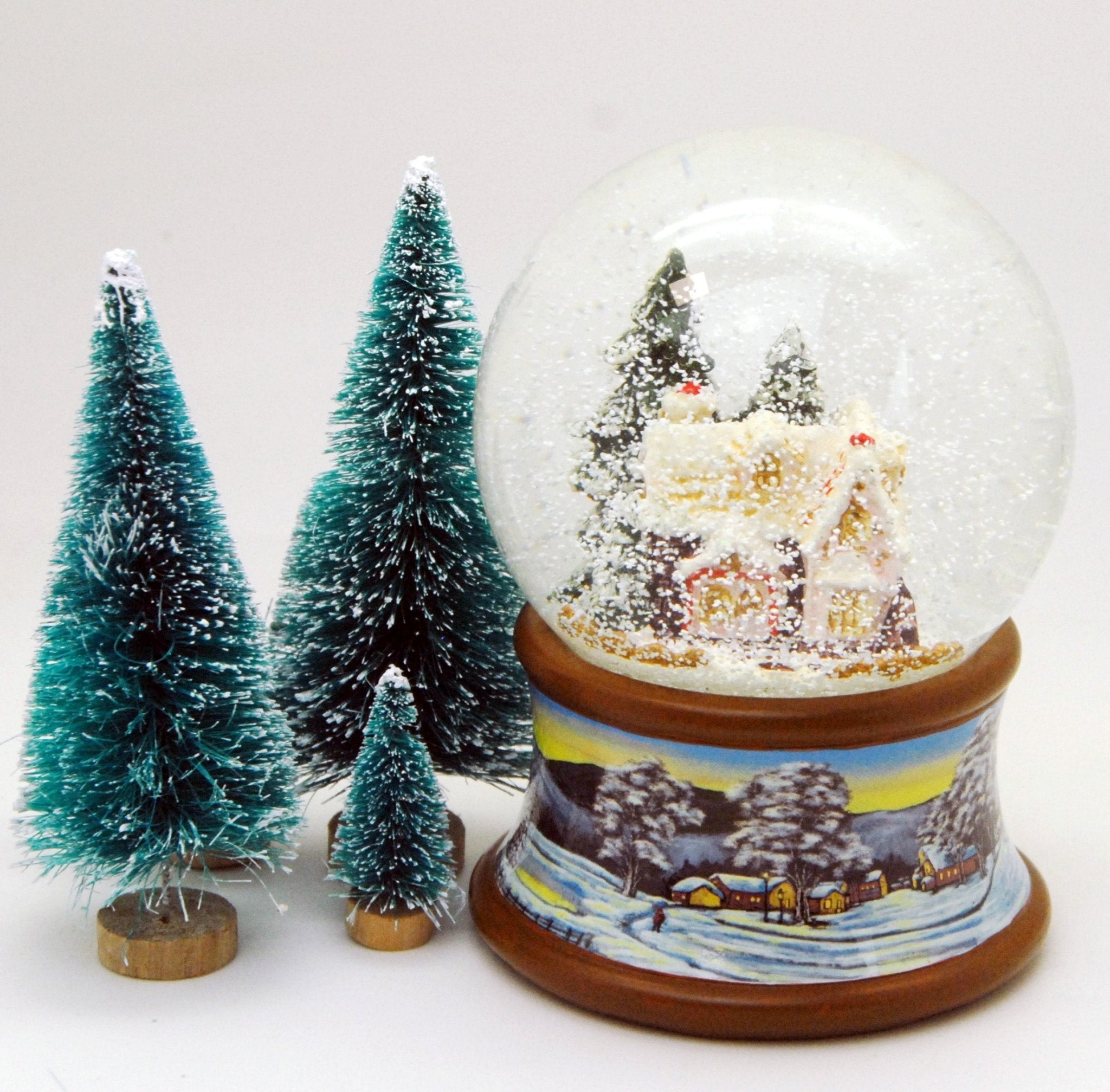 Nostalgische sneeuwbol met suikerbakkershuis en muziekdoos 14 cm-mezamstore.nl