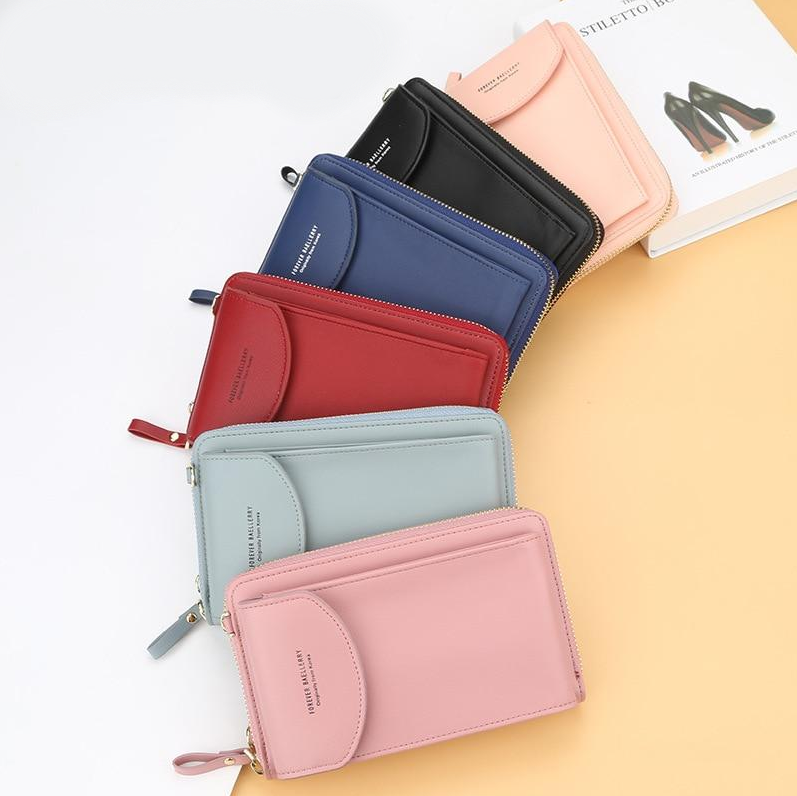 Elegante en Ruime Crossbody Handtas met Ritsvakken