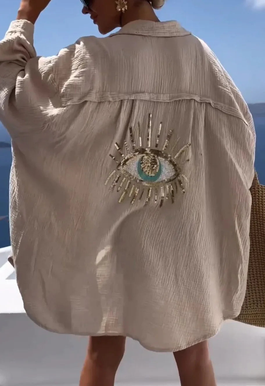 Blouse met Pailletten en Oogontwerp op Rug