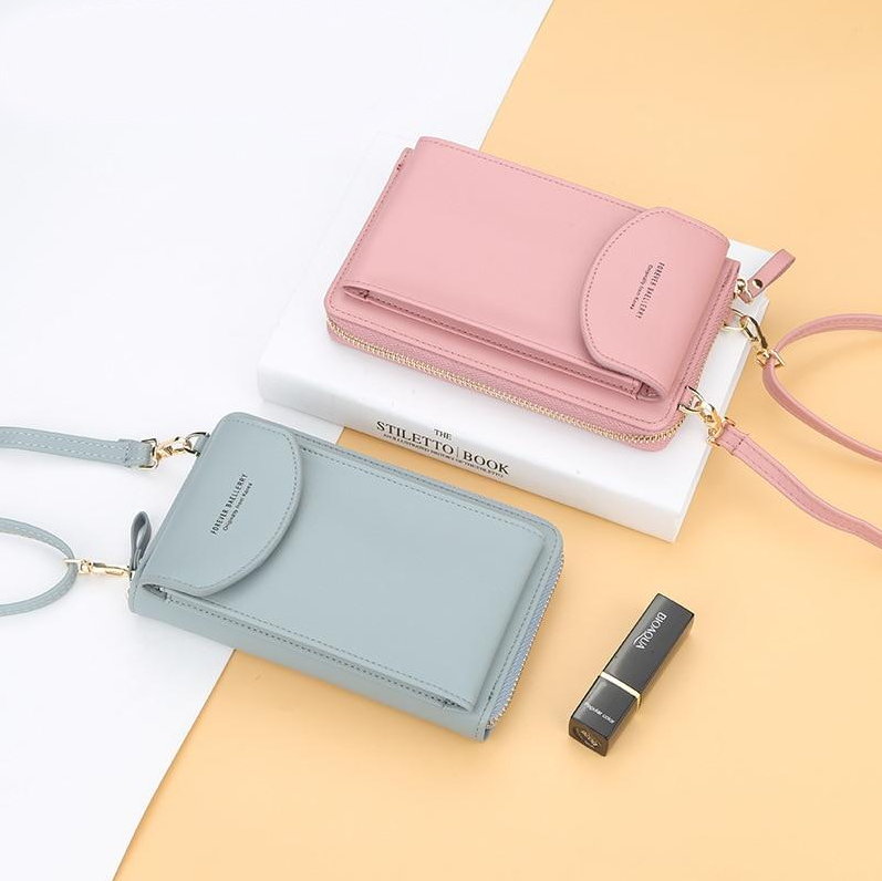 Elegante en Ruime Crossbody Handtas met Ritsvakken