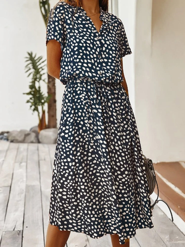 Zomerse midi-jurk met frisse print en korte mouwen