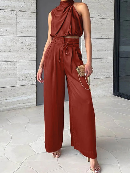 Modieuze Damesoutfit: Mouwloze Crop Top en Wijde Broek