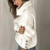 Lange dames coltrui pullover met knoopjes op de mouwen