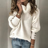 Lange dames coltrui pullover met knoopjes op de mouwen