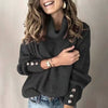 Lange dames coltrui pullover met knoopjes op de mouwen