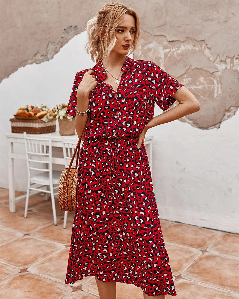 Zomerse midi-jurk met frisse print en korte mouwen