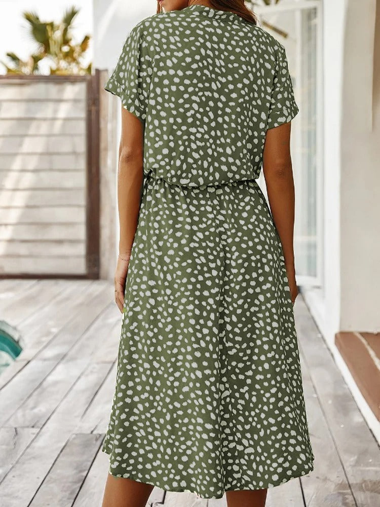Zomerse midi-jurk met frisse print en korte mouwen