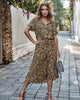 Zomerse midi-jurk met frisse print en korte mouwen