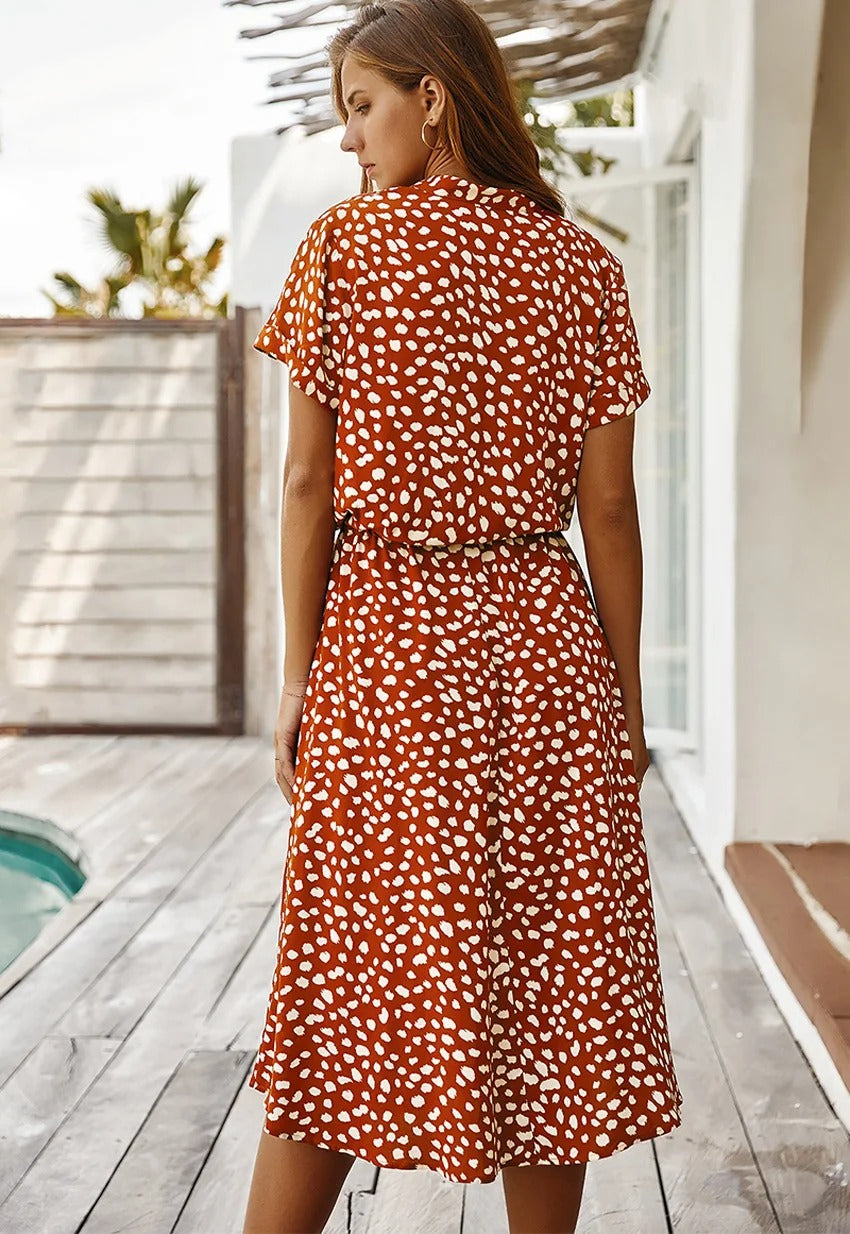 Zomerse midi-jurk met frisse print en korte mouwen