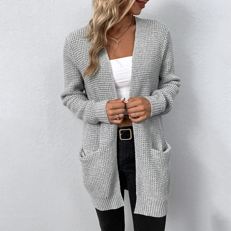 Gebreid damesvest – Lange open cardigan met zakken