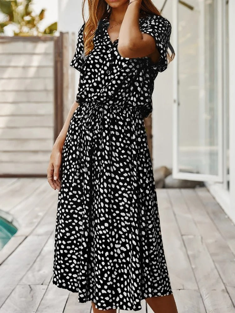 Zomerse midi-jurk met frisse print en korte mouwen