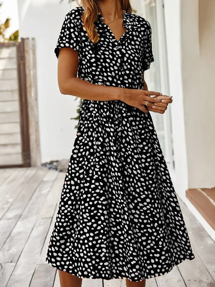 Zomerse midi-jurk met frisse print en korte mouwen