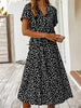 Zomerse midi-jurk met frisse print en korte mouwen