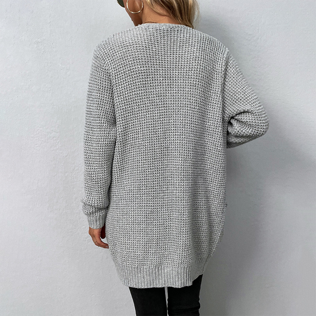 Lange damesvest met V-hals en zakken, ideaal voor herfst en winter